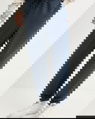 Tommy Jeans pantaloni de trening culoarea albastru marin, melanj, DM0DM22358