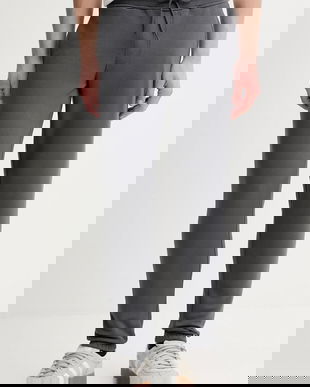 Tommy Jeans pantaloni de trening culoarea bleumarin, uni, DM0DM20473