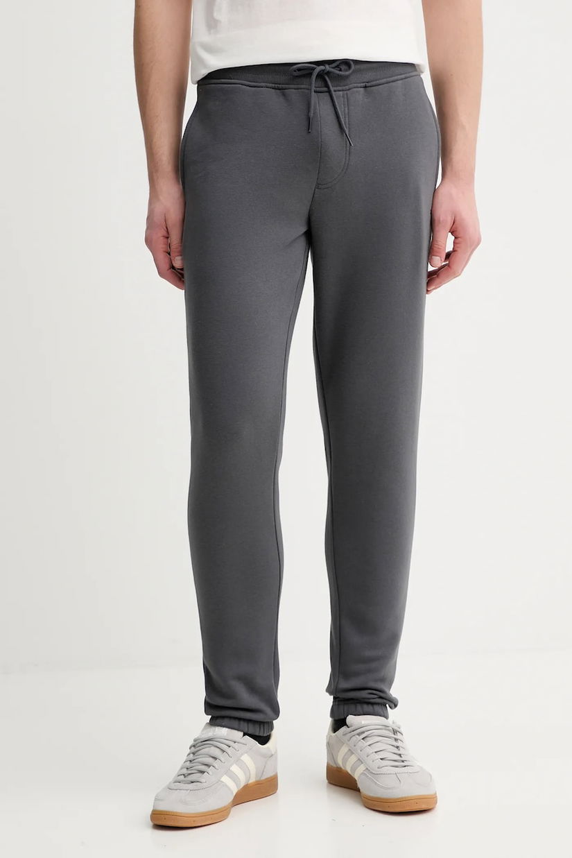 Tommy Jeans pantaloni de trening culoarea bleumarin, uni, DM0DM20473