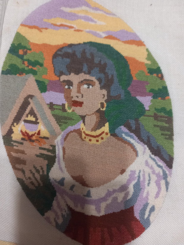 Vând un goblen lucrat manual, reprezentând un portret delica