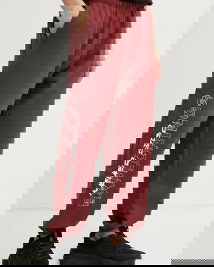 The North Face pantaloni de trening TNF X NSE barbati, culoarea rosu, cu imprimeu, NF0A8C3W0VO1