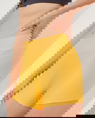 Under Armour pantaloni scurti femei, culoarea portocaliu, neted, high waist