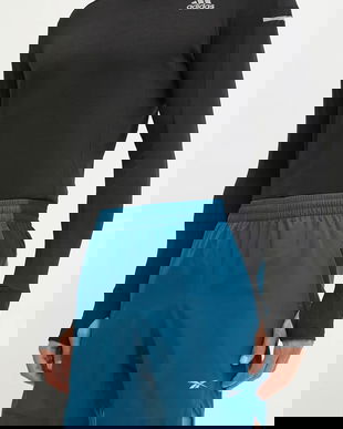 Reebok pantaloni scurți de alergare culoarea albastru marin, 100206008