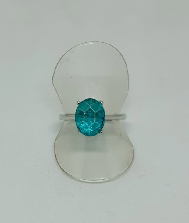 Inel ajustabil din argint cu un cristal Svarowski oval, polifatetat, turcoaz