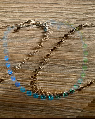 BRATARA MODEL TENIS  CU STRASURI,SEMNATA