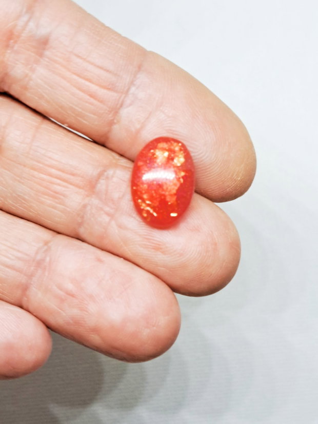 Cercei stud de culoare corai, în forma ovala