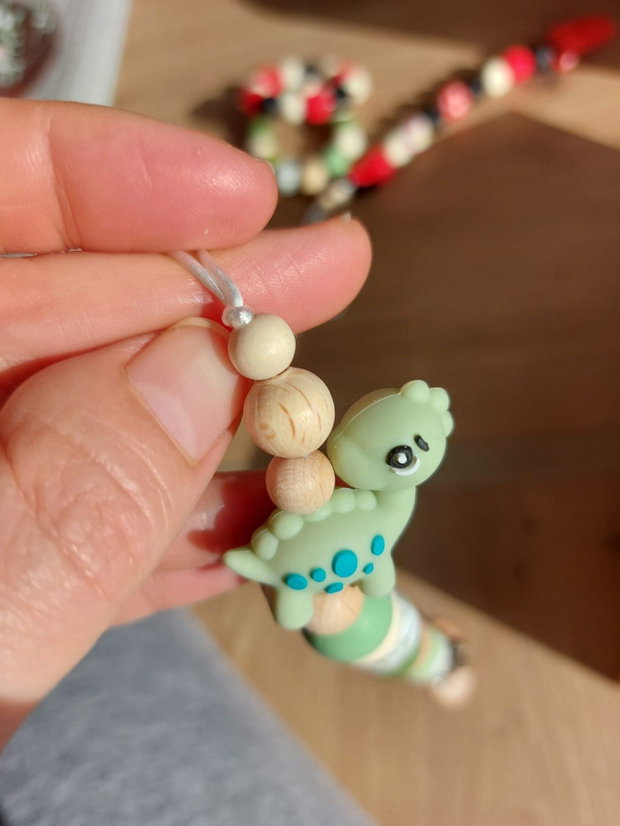 Set lănțișor si jucătie dentiție Dino