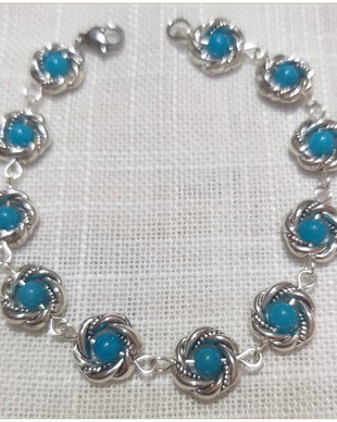BRATARA- "COLACEI" ARGINTII SI SIDEF BLEU-TURCOAZ