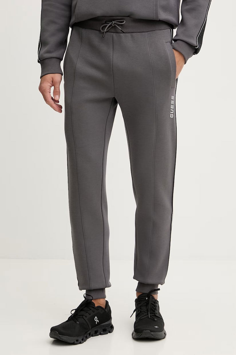 Guess pantaloni de trening MICKEY