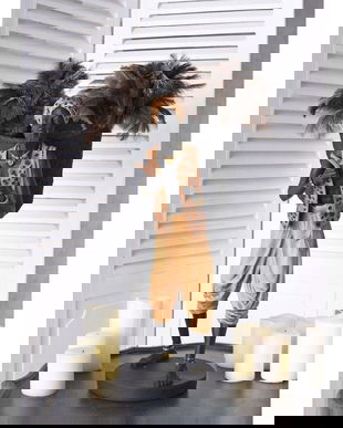 Statueta de gradina cu un african cu un cos