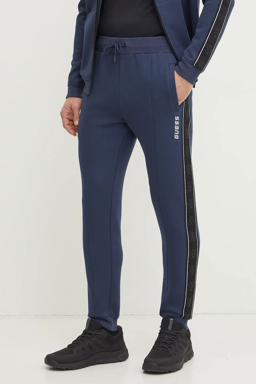 Guess pantaloni de trening MICKEY