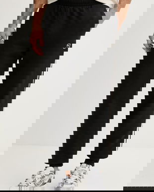 Puma pantaloni de trening bărbați din bumbac Essential Elevated