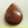 Brown goldstone cabochon 35x25x7.5 mm