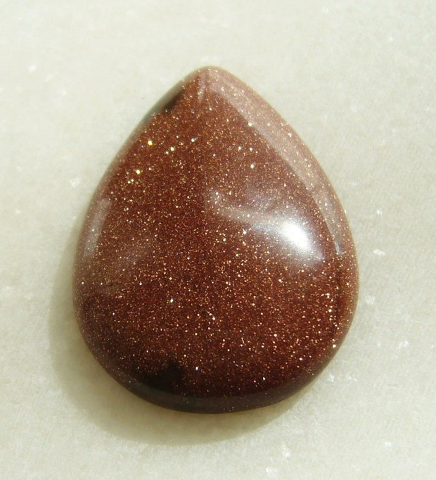 Brown goldstone cabochon 35x25x7.5 mm