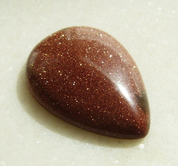 Brown goldstone cabochon 35x25x7.5 mm