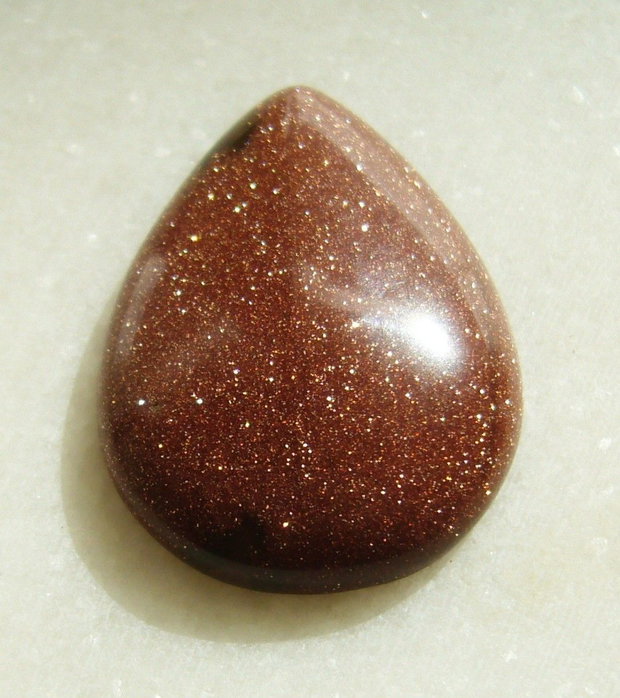 Brown goldstone cabochon 35x25x7.5 mm