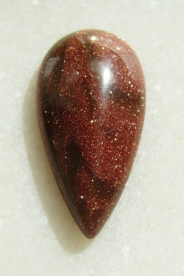 Brown goldstone cabochon 30x15x6 mm