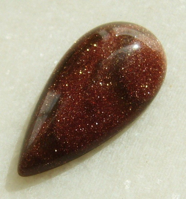 Brown goldstone cabochon 30x15x6 mm