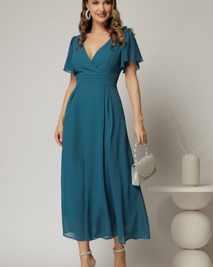 Rochie turcoaz lunga de ocazie din voal cu decolteul petrecut