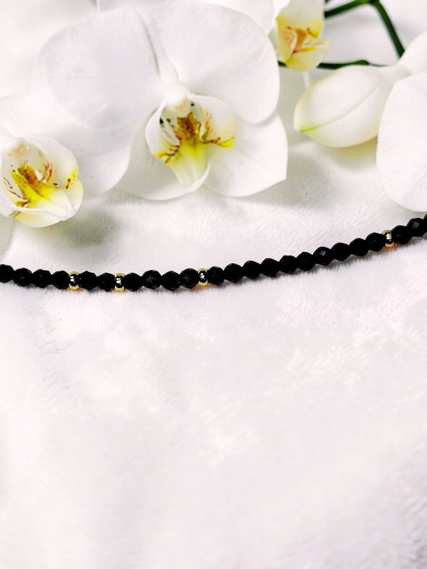 Colier choker cristale negre fațetate aurii