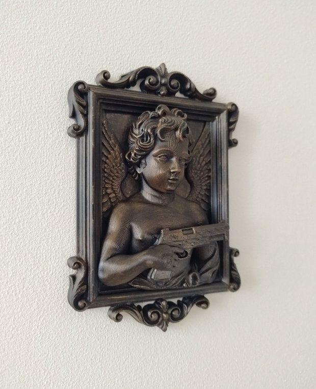Cupid with a gun