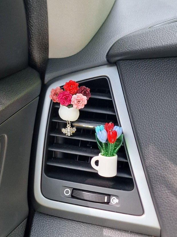 Decorațiune floral pentru grila de ventilație mașină