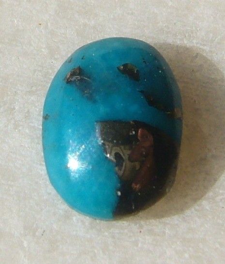 Turcoaz natural cu insertii de pirita aprox 10x7x3.5 mm