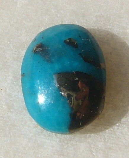 Turcoaz natural cu insertii de pirita aprox 10x7x3.5 mm