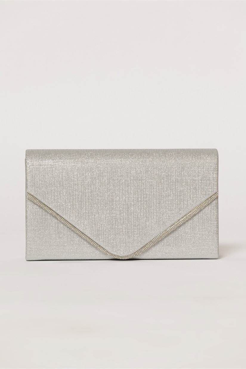 Clutch argintiu elegant cu clapeta decorata cu strasuri
