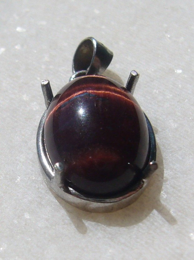 Ochi de taur cabochon in rama de argint .925 rodiat