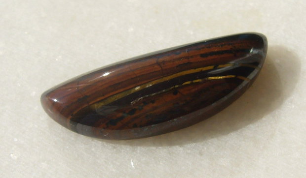 Iron tiger eye cabochon aprox 32.5x11x6.5 mm