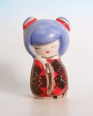 Brosa kokeshi portelan
