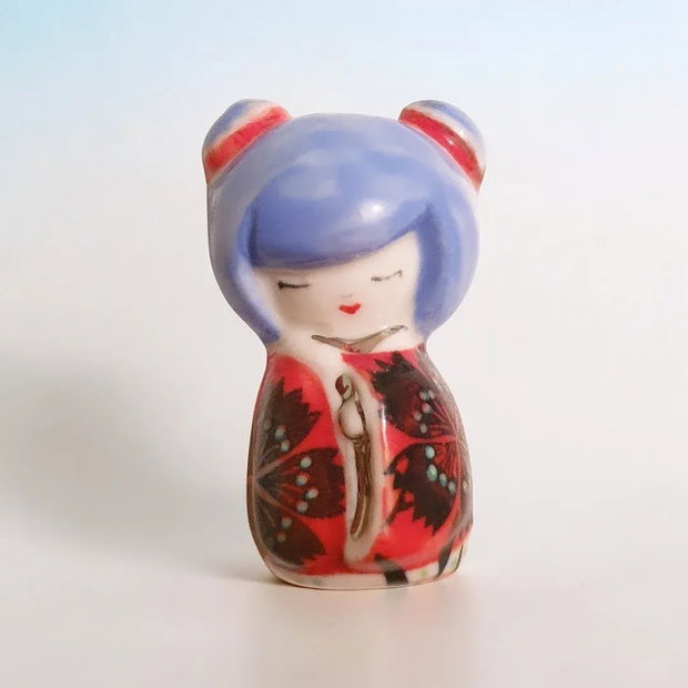 Brosa kokeshi portelan