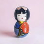 Brosa kokeshi portelan